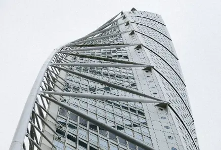 Unique architectural design of a skyscraper, symbolizing innovative inbound and outbound investment structuring solutions for global ventures.