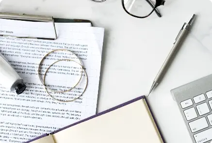 Clean workspace with financial documents and a pen, illustrating meticulous analysis for Cost & Margin Management and corporate cost optimization.